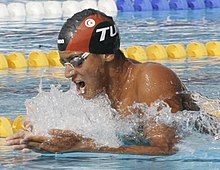 Oussama Mellouli doing the breaststroke