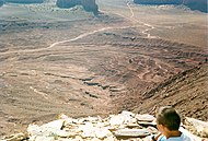 Layers in Monument Valley. These are accepted as being formed, at least in part, by water deposition. Since Mars contains similar layers, water remains as a major cause of layering on Mars.