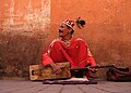 Moroccan musician playing the guimbri.