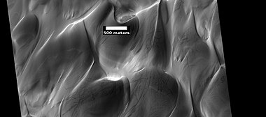 Dunes and dust devil tracks in Hooke Crater, as seen by HiRISE. There are also gullies just visible.