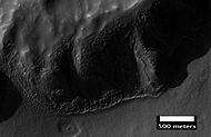 Layers in mantle deposit, as seen by HiRISE, under the HiWish program. Mantle was probably formed from snow and dust falling during a different climate.