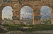 View through three of the northwesterly arches in the Colosseum's third storey