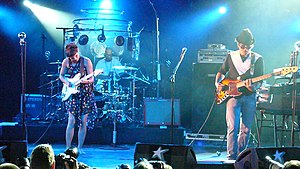 Olivia Merilahti (left) and Dan Levy (right) performing at the 2008 Paléo Festival