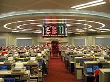 Large, empty room, with many desks and computer terminals