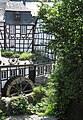 Roue de moulin et maison à colombages