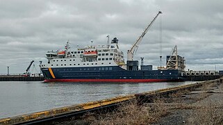 Motor vessel Bella-Desgagnes[23] loading at Rimouski-Est, port, St. Lawrence Estuary, Quebec