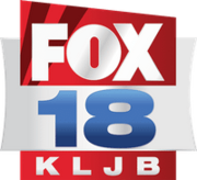 In a red box with an angled top, the Fox network logo, with two sublimated darker stripes resembling a pair of searchlights. Sitting beneath that, in a silver rectangle with concave sides, is a blue numeral 18 in a bold, wide sans serif. Beneath in a red box are the white letters K L J B.