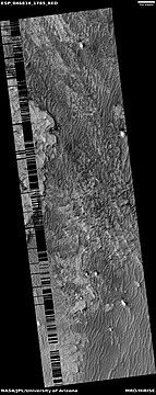 Wide view of layers in Schiaparelli Crater, as seen by HiRISE under HiWish program. Part of the picture is degraded. Parts of this image are enlarged in other images that follow.