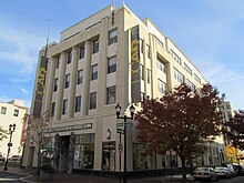 Five-story limestone building in downtown