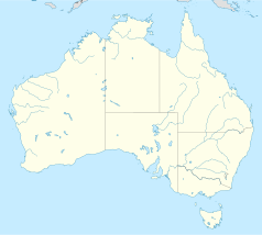 Mapa konturowa Australii, u góry po prawej znajduje się punkt z opisem „Innisfail”