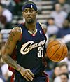 Larry Hughes with the Cavaliers in April 2007 dribbling a ball