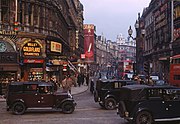 Kodachrome photo by Chalmers Butterfield of Shaftesbury Avenue from Piccadilly Circus, in the West End of London, c. 1949.