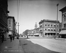 A black-and-white photograph of Main Street in Ann Arbor