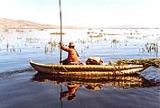 Uro-Indian at work in a reed boat