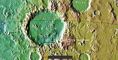 Galle Crater. Colors show elevations. Arrow indicates a layered mound that is enlarged in other images to follow.