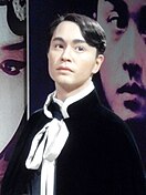 Leslie Cheung with a microphone