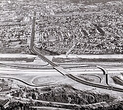 Aerial view of recently constructed Golden State Freeway (I-5) with Atwater Village in the background, separated by the Los Angeles River (1957)