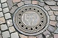 Deutsch: Kanaldeckel mit dem Wappen der Stadt Warendorf English: Manhole cover with the coat of arms in Warendorf, Germany