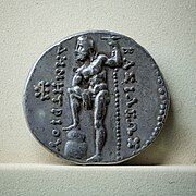 Tétradrachme en argent de Démétrios Poliorcète (frappé v. 289-288 av. J.-C.) représentant Poséidon dans la pose de la statue du Latran.