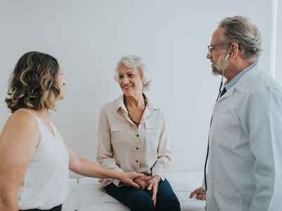 An older woman with her daughter at a doctor's appointment