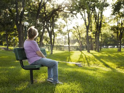 Woman in park, grieving