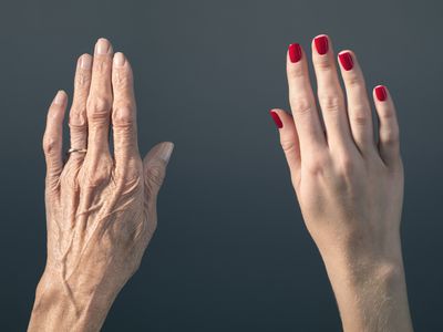 An older hand vs. a younger hand