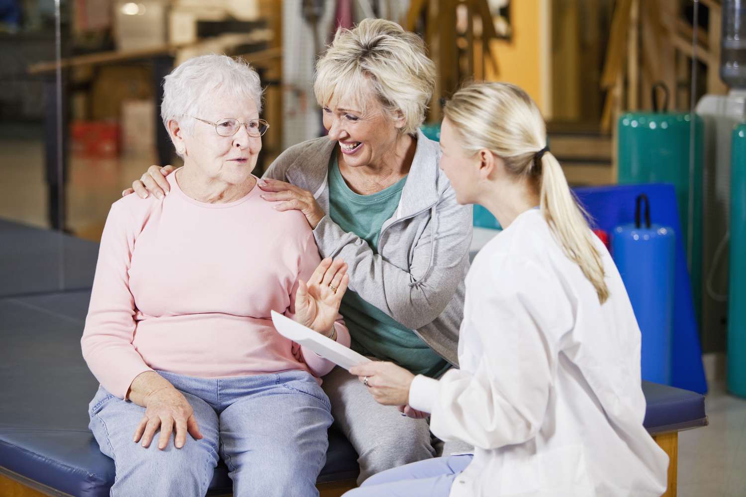 Woman and daughter in physical therapy.