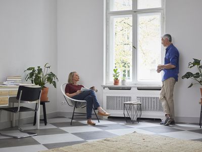 Mature couple talking at home