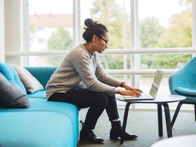 woman on laptop in living room