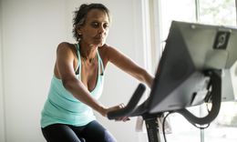 Senior woman on exercise bike