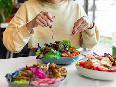 Unrecognizable woman eating iron rich foods