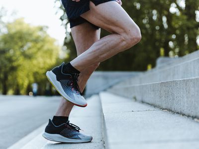 Close Up Of Legs Of A Sporty Man Training Up On The Stairs 