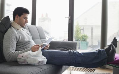 Man with broken neck reading