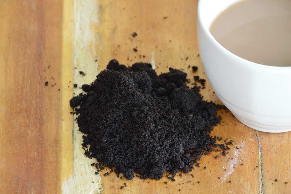 Is it safe to dispose of coffee grounds down the sink?