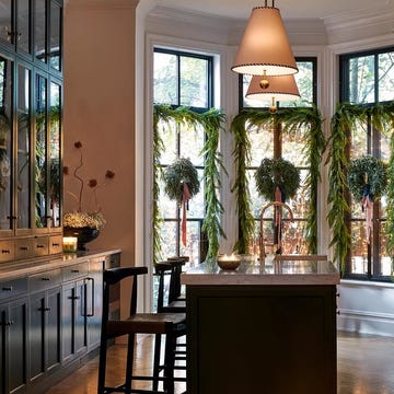 a kitchen with a large window