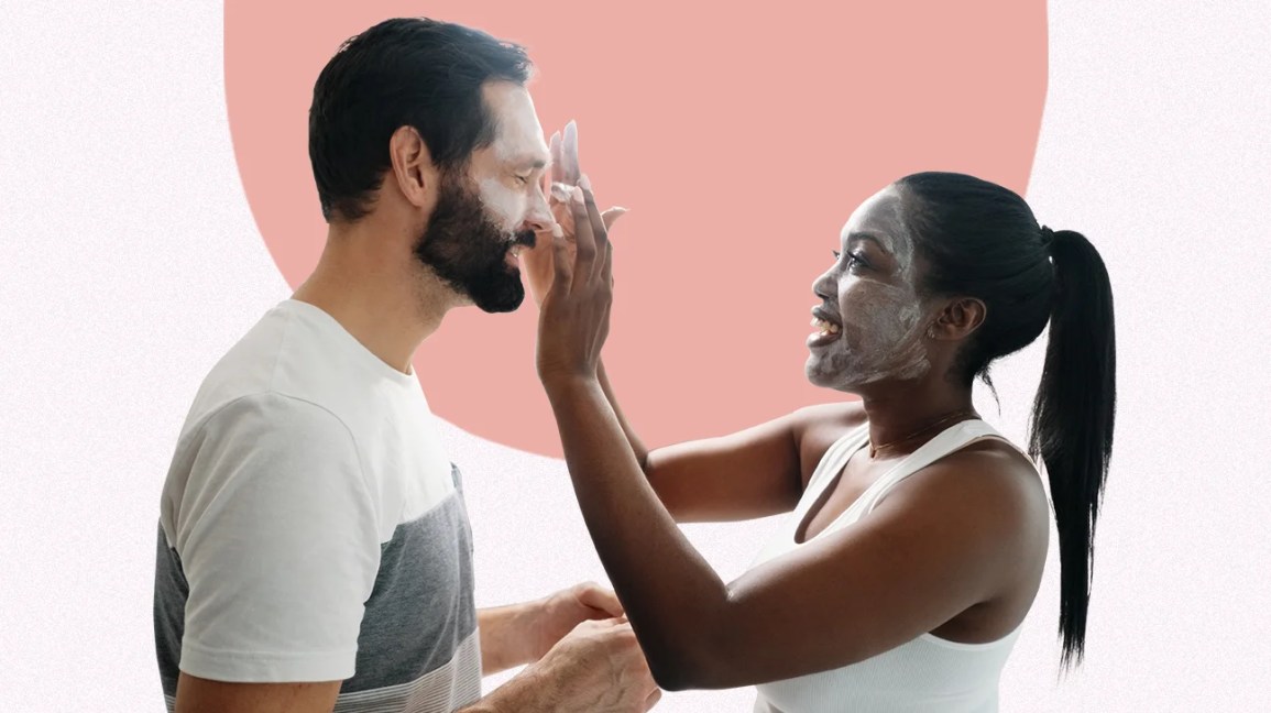 A couple applying skin care