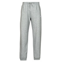 Oblečenie Muž Tepláky a vrchné oblečenie New Balance FRENCH TERRY JOGGER Šedá